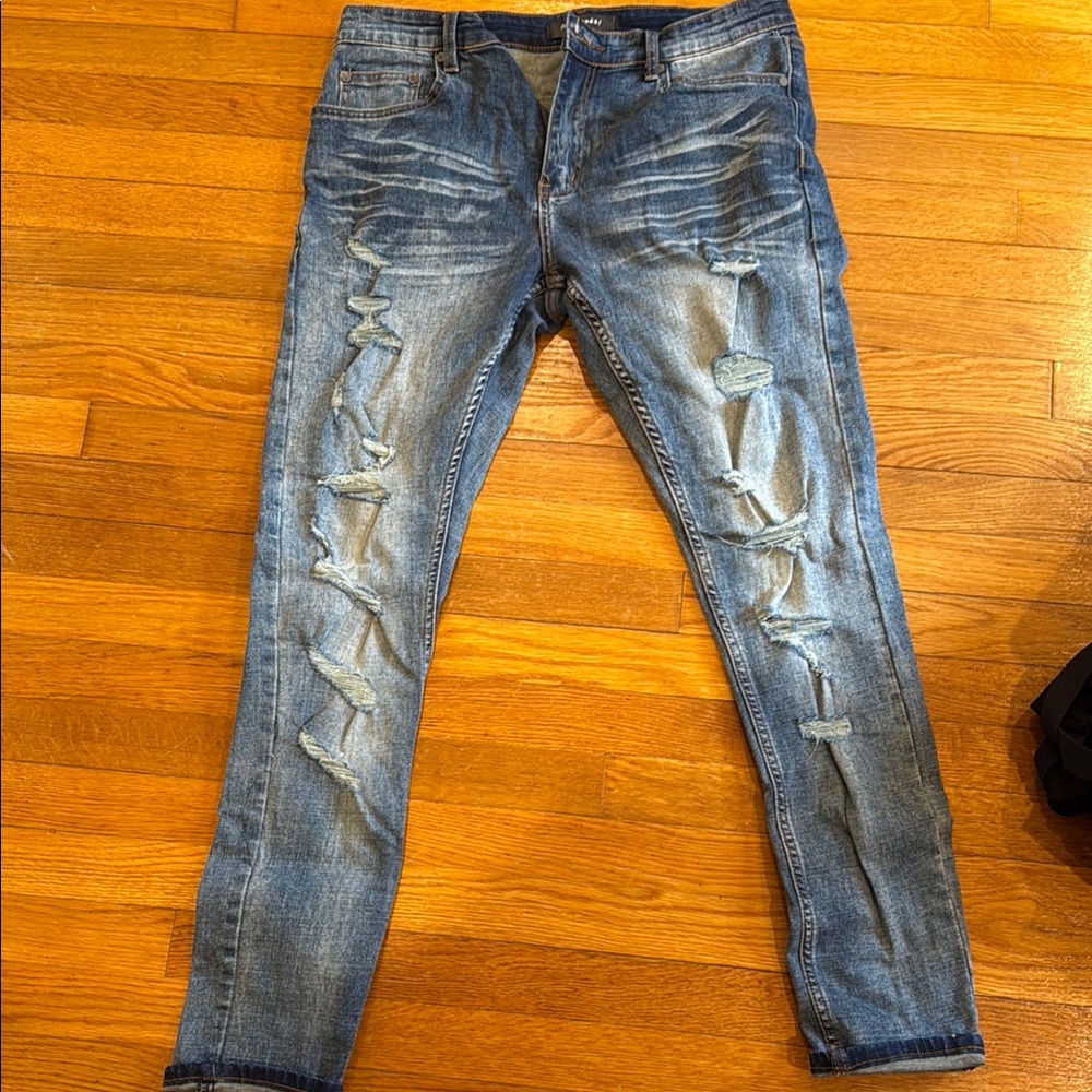 Distressed Blue Jeans